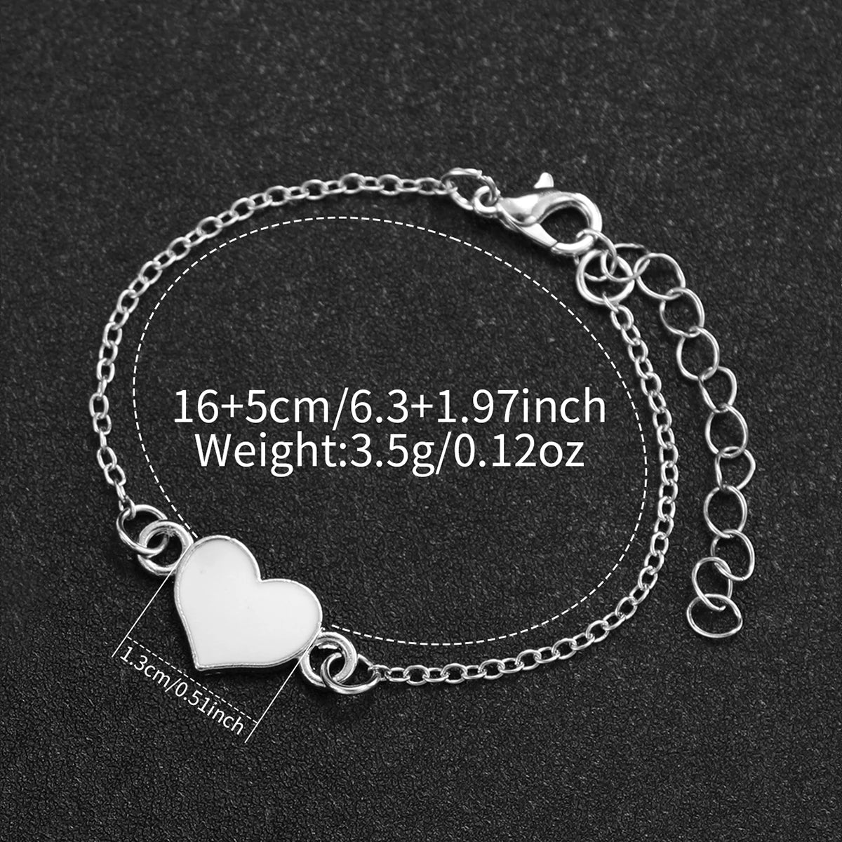 2 Teile/satz Mode frauen Uhr Aushöhlen Musical Note Zifferblatt Stahl Band Quarz Uhren Herz Armband Set