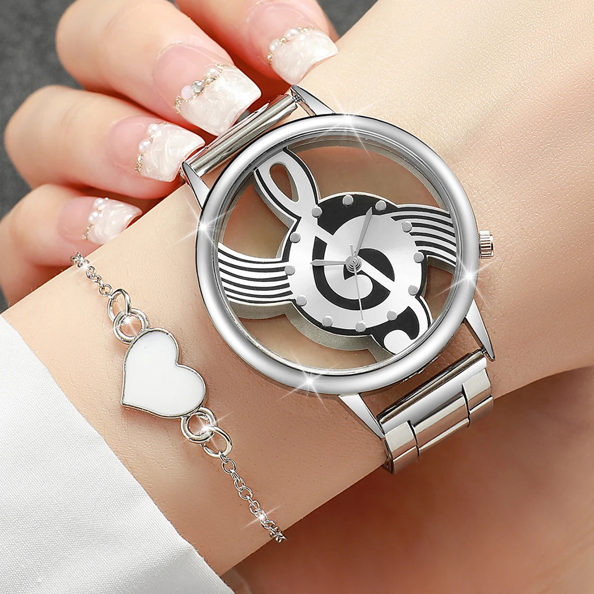 2 Teile/satz Mode frauen Uhr Aushöhlen Musical Note Zifferblatt Stahl Band Quarz Uhren Herz Armband Set